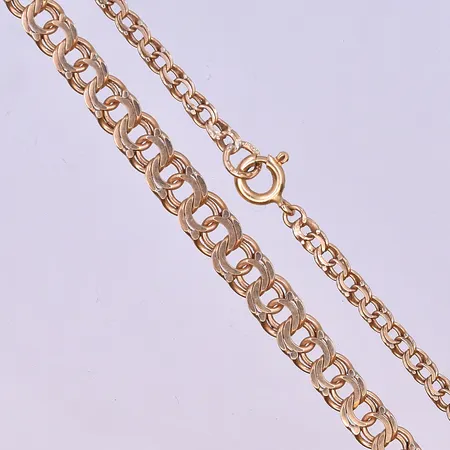 Armband Bismarck med 3 berlocker längd 19,5 cm bredd 5 mm 18K.  Vikt: 10,5 g