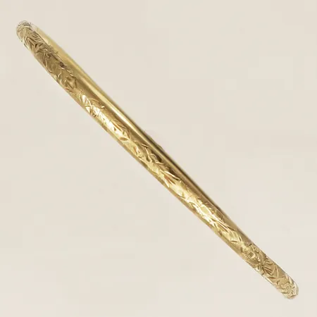 Armring med dekor Ø6,5cm bredd 3,2mm smärre bucklor 14K Vikt: 7,3 g
