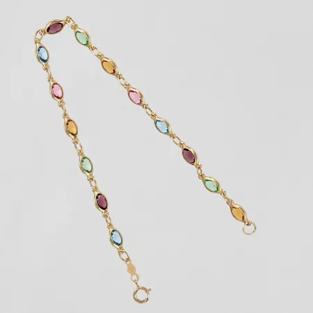 Armband med stenar i glas längd ca 18cm, bredd ca 1-4mm 18K Vikt: 2,6 g