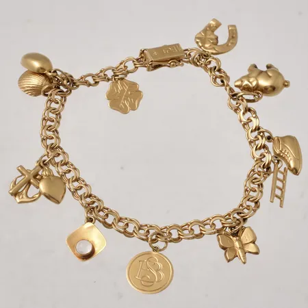 Armband 19cm Bismarck bredd 4,5mm, 11st berlocker, M.K:S Guldsmedsatelier Ab, 1962, 18K, 16,11g.