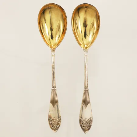 Två konfektskedar längd 17cm GAB år 1919 delvis förgyllt silver 830/1000 Vikt: 87,5 g