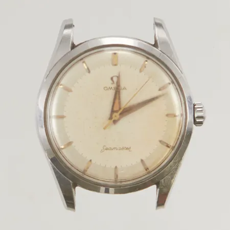 Herrur Omega Seamaster 35mm stål manuell, max uppdragen, originalglas samt krona, går några sekunder och stannar, servicebehov.