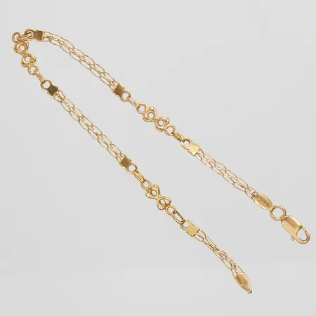 1 Armband längd 19cm, bredd 4mm, förstärkt låsögla, slitna svenska stämplar, 18K vikt 3,7g.