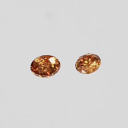 Lösa diamanter ca 1x0,05ct 1x0,09ct brun/orangefärgade/VS-Si