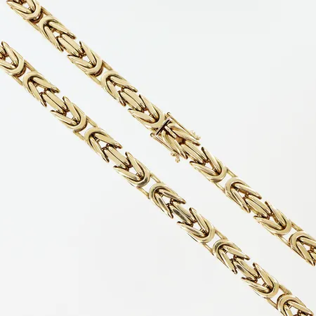 Armband X-länk längd 19cm bredd 11mm 18K.  Vikt: 22,1 g