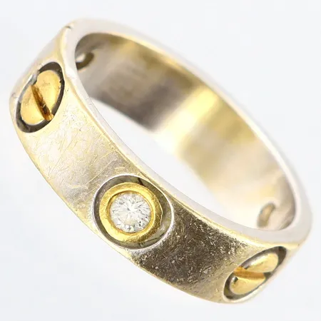 Ring med vita stenar stl: 18½, bredd: 6mm, sten saknas, tvåfärgad, OBS! Ej märkes design! 18K Vikt: 7,7 g