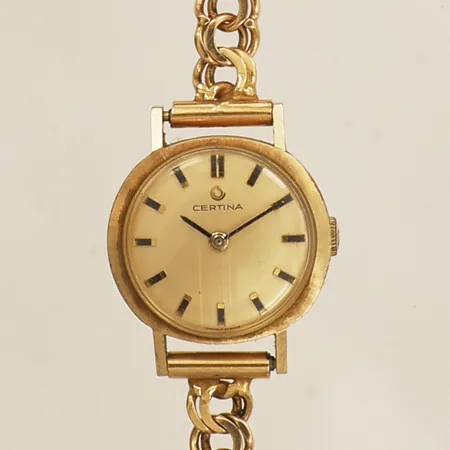 Armbandsur Certina 14K quartz Ø21mm armband Bismarck 18K med integrerade berlocker längd inkl uret 19cm bredd 6,3mm stenar repor går ej 18K  Vikt: 23,3 g