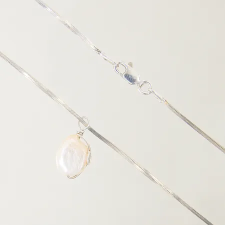 Hänge kors 33x15mm vitguldsdetaljer, mindre hål, 18K  Vikt: 1,1 g