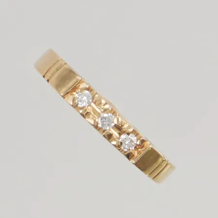 Ring med diamanter 3x ca 0,03ct stl:17¾ bredd 3mm 18K 2,4g.