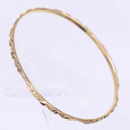 Armring mönstrad dekor Ø61mm bredd 3mm, ostämplad, 18K Vikt: 11,8 g