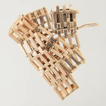 Armband X-länk längd 19cm  bredd 5,6mm 18K  Vikt: 9,7 g