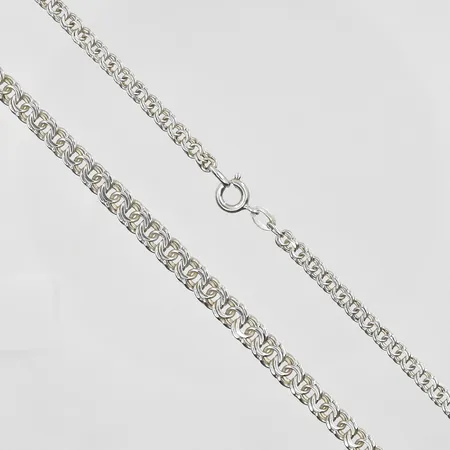 Armband X-länk längd 19cm, bredd 15mm, Brofod Aktiebolag, tillverkat A10/1975, glappt lås, silver 925/1000. Vikt: 38,8 g