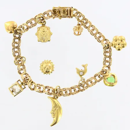 Armband Bismarck med 8 berlocker, 1 lös berlock, längd: 18cm, bredd: 5,2mm, 18K Vikt: 16,8 g