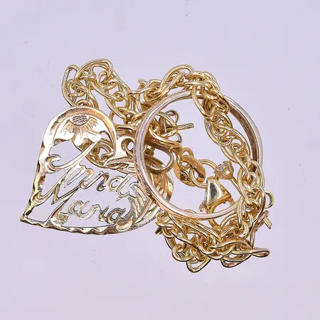 Ring med vita stenar stl:18, bredd 2-14 mm skena i guld och stenfattningen i silver 830/1000 och 18K. Vikt: 3,4 g