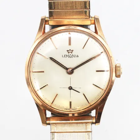 Herrur Lemania, guld på stål, automatisk, Ø34mm, repigt plexiglas, flexband ej original, inga tillbehör.