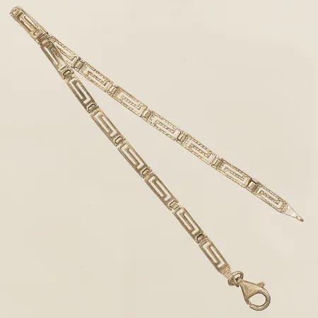 Armband med genombruten meanderdekor längd 19,5cm, bredd 3,5mm silver 925/1000 Vikt: 5,9 g