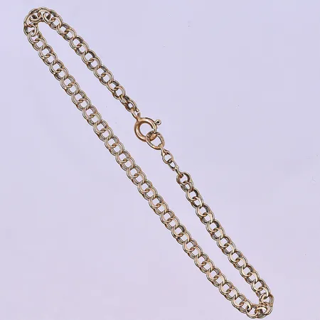 Armband X-länk längd 19,5 cm bredd 12 mm 18K. Vikt: 20,9 g