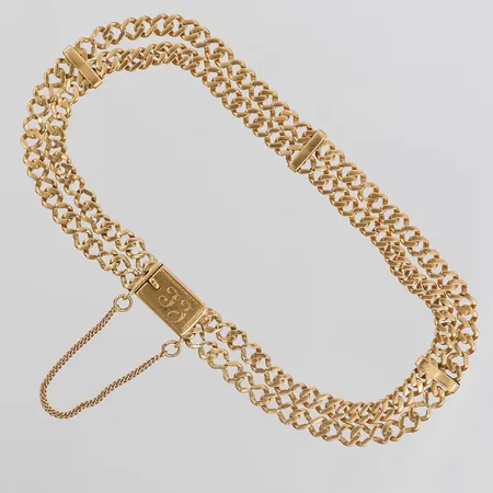 Armband tvåradigt med monogramgravyr J.J, slitage på länkar, längd 21cm, bredd 6mm, 18K guld Vikt: 10,7 g