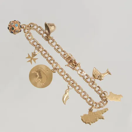 Armband Bismarck 19cm bredd 5mm berlocker 18K 20,5g.