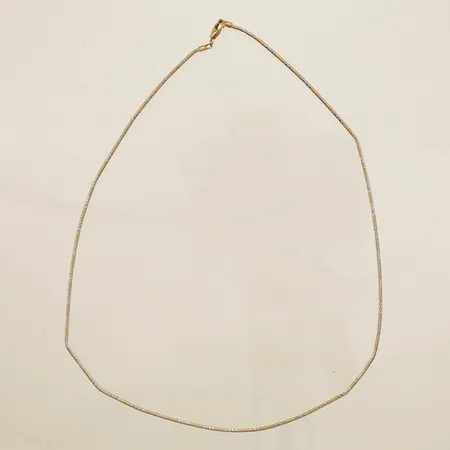 Collier längd 42cm bredd 1,2mm tvåfärgad ojämnheter på länk buckligt 18K Vikt: 5,2 g