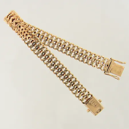 Armband längd 20,5cm bredd 13,4mm vissa länkar buckliga 18K  Vikt: 26,6 g