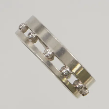 Ring diamanter 11x totalt 0,15ctv stl:20 bredd 6mm 18K 6,0g.