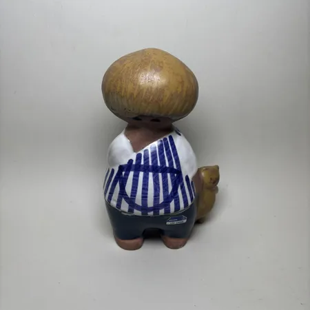 Figurin Malin av Lisa Larsson för Gustavsberg, höjd ca 18,5cm, stengods, skadad etikett, signerad.