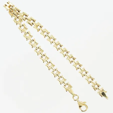 Hänge nalle 16x10mm ihålig 18K.  Vikt: 0,3 g