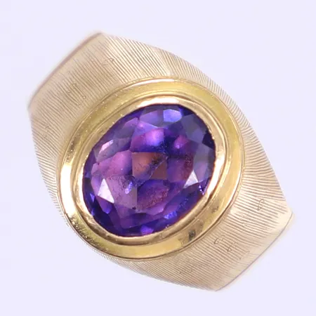 Hänge med blå sten 44x26mm ostämplad 18K Bruttovikt: 5,6g Vikt: 5,6 g
