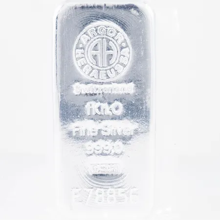 Silvertacka 1kg Argor Heraeus SA Switzerland, serienr E79012, inplastad, finsilver 999/1000 1000g.
