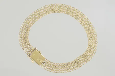 Armband längd 21 cm bredd 9 mm 18K  Vikt: 15,2 g