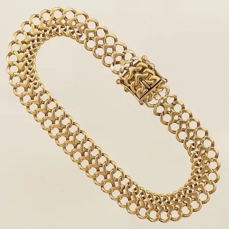 Armband fiskben längd 21cm bredd 18,4mm år 1988 trögt lås 18K Vikt: 22,5 g