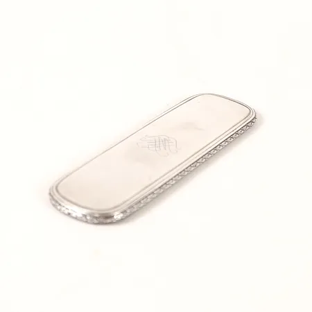 Del från en borste, längd 18cm, bredd 5,5cm, silver 830/1000 Vikt: 59,9 g