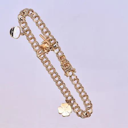 Armband X-länk längd 19cm bredd 12mm 1 säkerhetsåtta saknas 18K. Vikt: 24,6 g