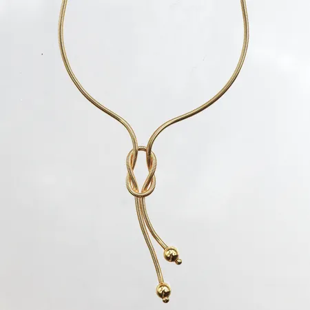 Collier, längd 42cm, bredd1,7mm, 18K. Vikt: 13,8 g