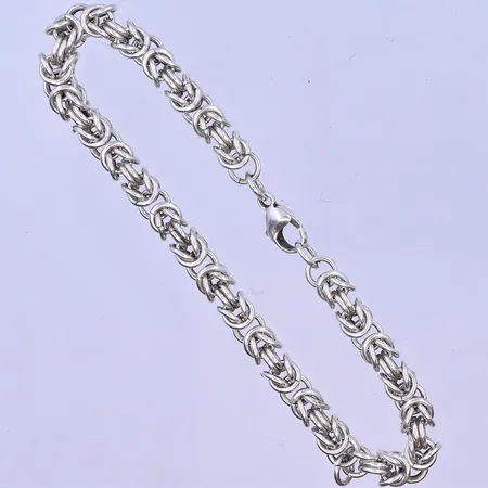 Armband längd 19,5cm bredd 5mm saknas en ögla på länk silver 925/1000. Vikt: 20,3 g