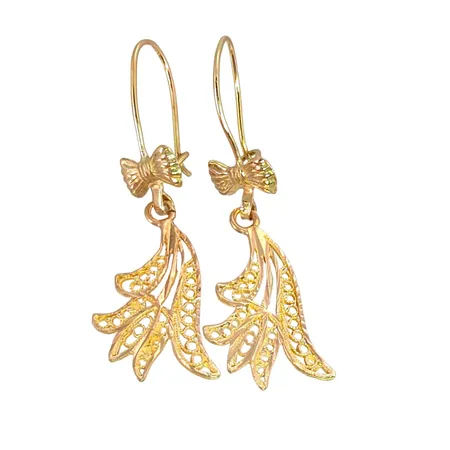 Örhängen i 14K guld, total längd 39 mm, bredd 13 mm Vikt: 1,8 g