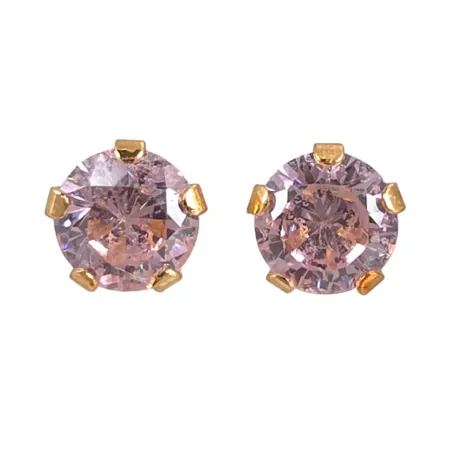 Örhängen i 18K guld med rosa stenar, örhängenas diameter 3 mm, en plopp saknas, fint skick, stenar utan anmärkning Vikt: 0,3 g