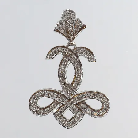 Hänge med diamanter ca 60 x 0,01-0,02ct ca 0,90ctv 41,5x28mm ink ögla vitguld 18K. Vikt: 12,4 g