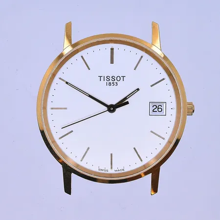 Herrur Tissot quartz datum Ø34 mm graverad boett 18K. Vikt: 0 g