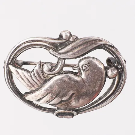 Brosch duva, ca 26x34mm, något glapp i nålen silver 830/1000 Vikt: 9,8 g på auktion i Skärholmen hos Pantbanken Sverige