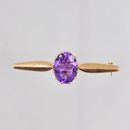 Brosch med lila sten stl 14x45mm 18K Vikt: 3,9 g