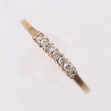 Alliansring med diamanter 7 x ca 0,01ct stl:15¾, bredd 1,4-2,3mm, Heribert Engelbert AB 1987, 18K Vikt: 1,5 g