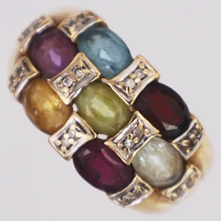 Ring diamanter 20 x ca0,005ct samt topas, granat, ametist, peridot, citrin, rhodolit Guldfynd stl:17¼, bredd 2,3-11,7mm, 18K Vikt: 5,7 g