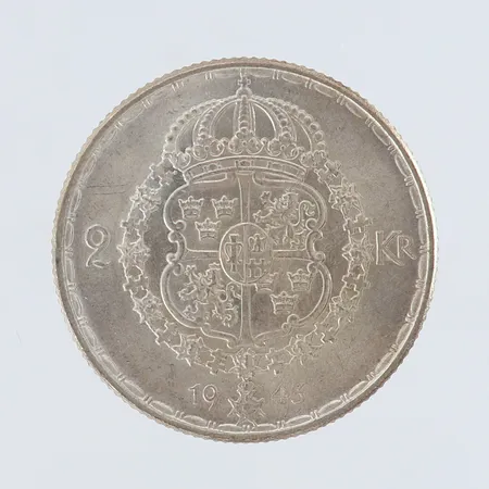 Mynt Gustaf V Sveriges Konung med folket för fosterlandet Ø31mm 2KR, år 1943 Silver 400/1000.  Vikt: 14 g