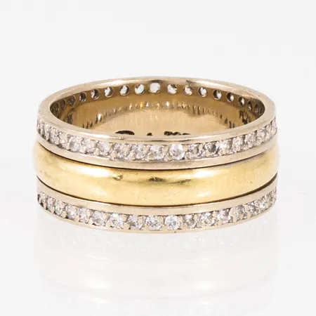 Ring med roterande mittring och vita stenar stl:17 bredd 8mm, vitt- och gult guld 14K 6,3g.