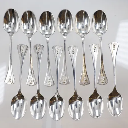 36st Kaffeskedar samt 1 dopsked (gravyr) olika modeller silver 830/1000 Vikt: 568,4 g