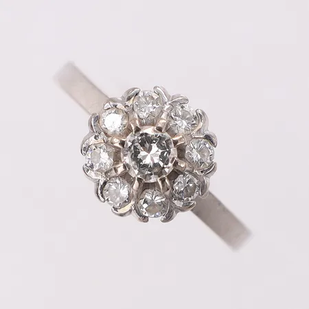 Ring med diamanter 0,50ctv enligt gravyr stl:16½, bredd 2-9,4mm, G. Dahlgren & Co Ab, Malmö 1978, vitguld, 18K Vikt: 3,7 g