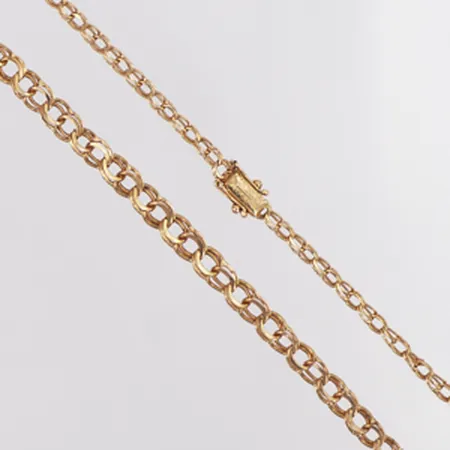 Collier doserad Bismarck längd 51,5cm, bredd 3,1-5,6mm, N S E Guldvaru Aktiebolag år 1967, ojämna länkar, 18K Vikt: 15,3 g