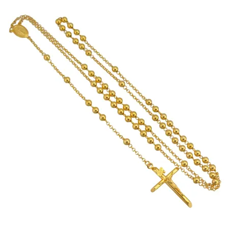 Collier med Krucifix i 21K guld, modell utan lås, inre omkrets ca 65 cm, längd från översta delen av brickan till nedersta delen av krucifixet 15,5 cm, kedjans bredd 2 mm, klotens diameter 4 mm, fint skick Vikt: 18,7 g